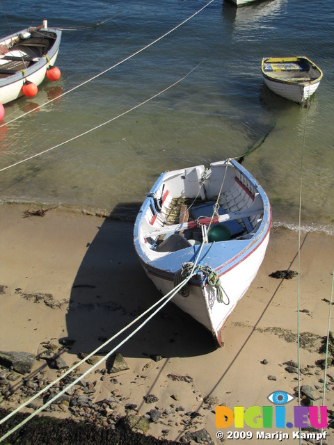 SX09035 Row boats in Mousehole harbour